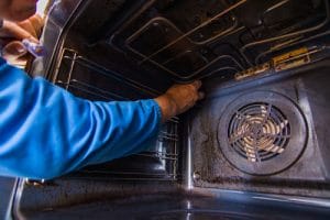 fixing the oven in kitchen